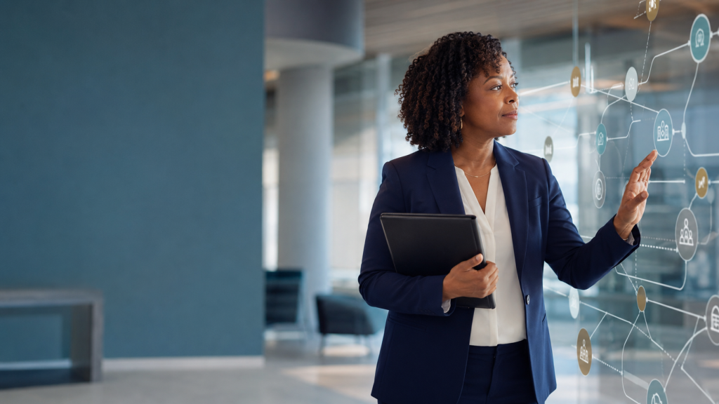 A DBH in consulting looks at a visual chart, planning, and strategizing.